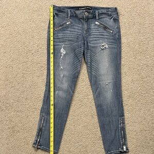 Women's Skinny Jeans in Faded Blue with Zipper Accents